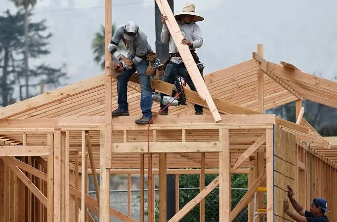 Framing crew working on a roof on-site